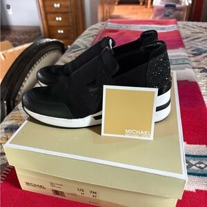 Michael Kors Black Slip-On Sneakers Modern Athletic Style
